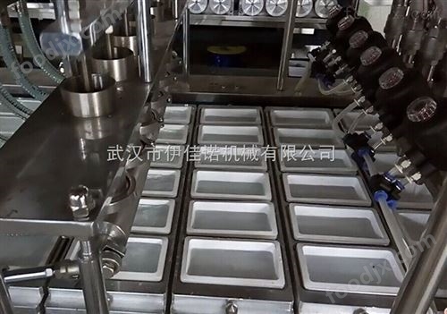 伊佳诺全自动盒装内脂豆腐灌装封口机 设备灌装封口机
